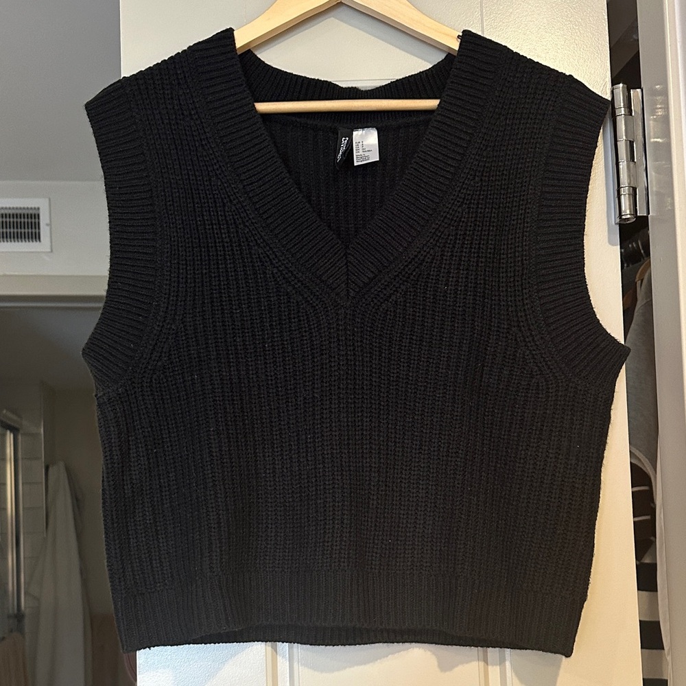 Black sweater vest